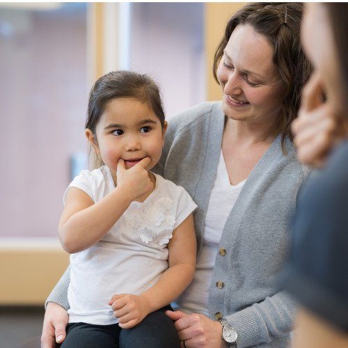 speech-therapist-works-with-a-kindergartenage-ethnic-girl-picture-id1155537762